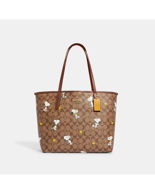 Coach Outlet Brown Coach X Peanuts City Tote In Signature Canvas With Snoopy Woodstock Print