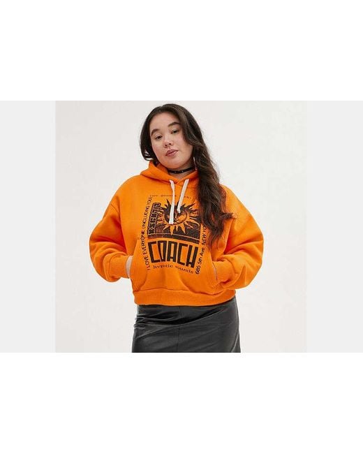 COACH Orange The Lil Nas X Drop Cropped Pullover Hoodie