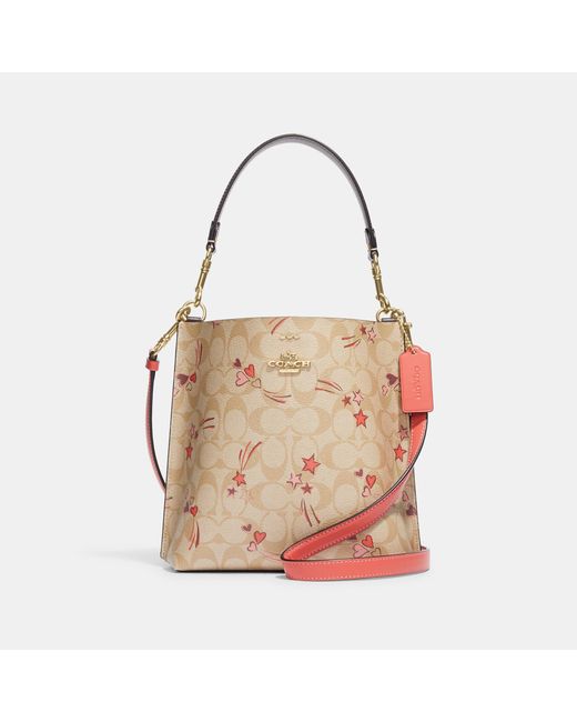 Coach Outlet Pink Mollie Bucket Bag 22 In Signature Canvas With Heart And Star Print