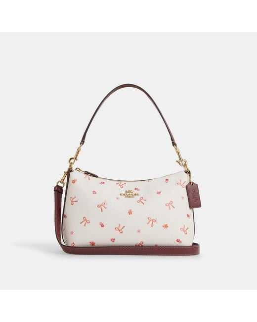 Pink and 2025 white coach bag
