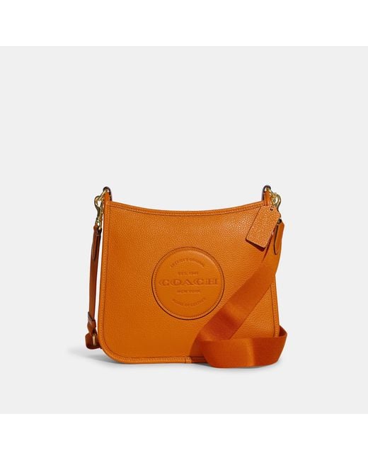 Coach Outlet Dempsey File Bag in Orange | Lyst