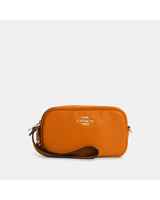 Coach Outlet Leather Jamie Wristlet in Light Orange (Orange) Lyst