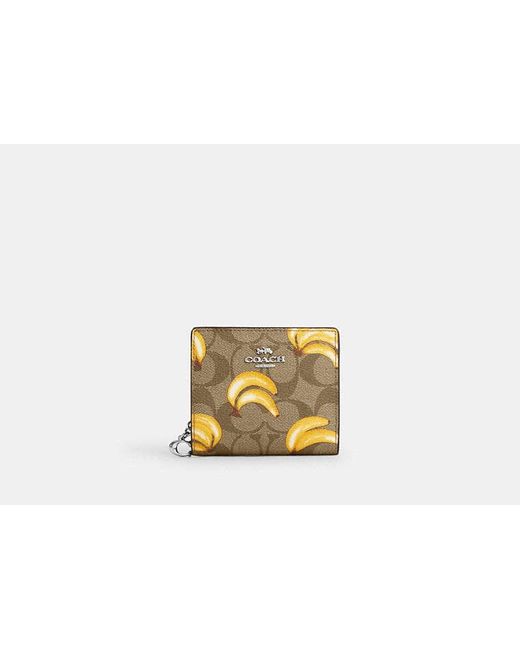 COACH Black Snap Wallet In Signature Canvas With Banana Print