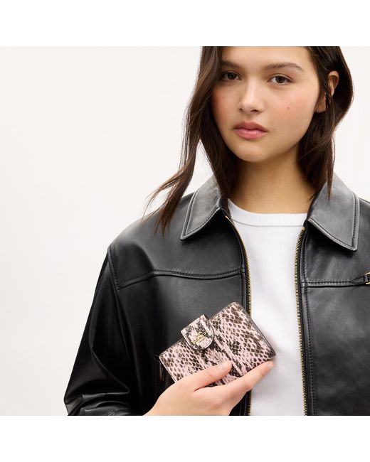 COACH Pink Medium Corner Zip Wallet