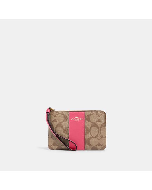 Coach Outlet Corner Zip Wristlet In Signature Canvas in Pink Lyst
