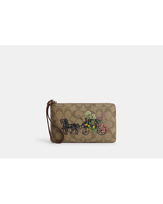 COACH Black Large Corner Zip Wristlet In Signature Canvas With Floral Horse And Carriage