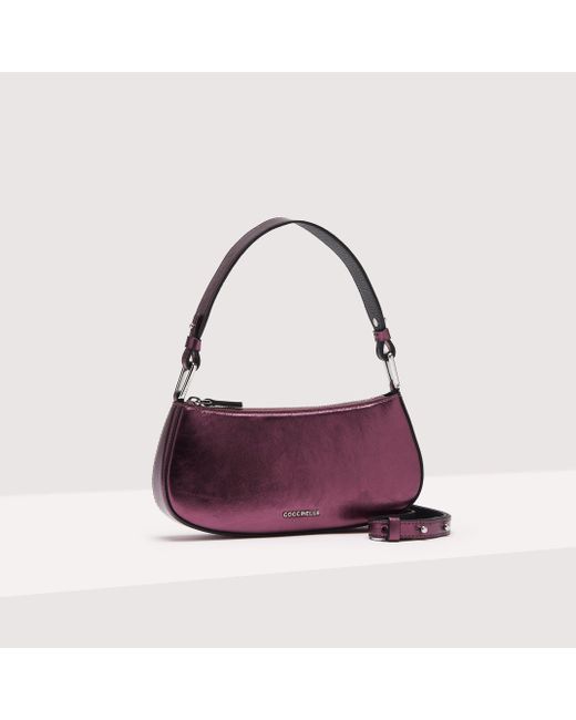 Coccinelle Purple Minibag aus perlmuttfarbenem Leder Merveille Pepita