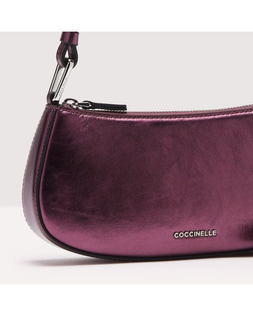 Coccinelle Purple Minibag aus perlmuttfarbenem Leder Merveille Pepita