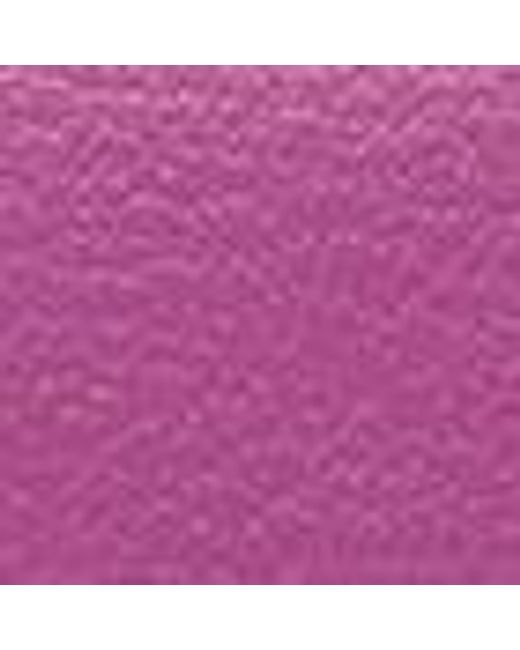 Coccinelle Purple Minibag aus genarbtem Leder Magie