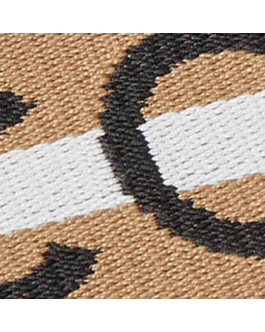 Coccinelle Metallic Fabric Shoulder Strap Logo