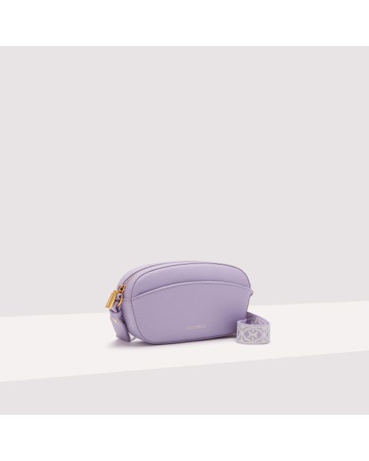 Coccinelle Purple Minibag aus genarbtem Leder Enchanteuse