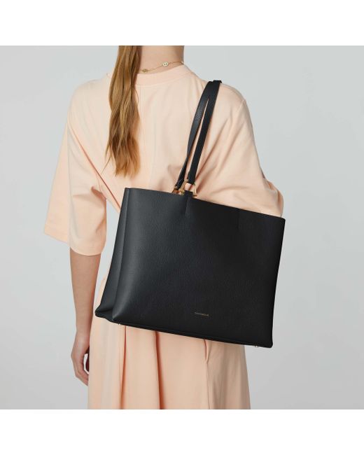 Coccinelle Black Grained Leather Handbag Hop On Medium