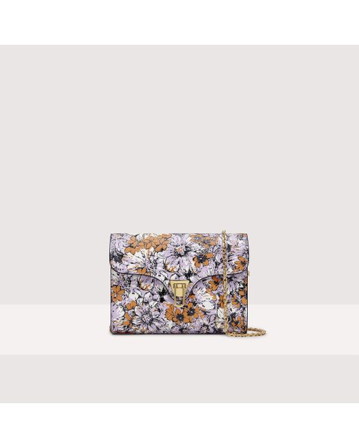 Minibag in Pelle con stampa floreale Beat Flower Print di Coccinelle in White