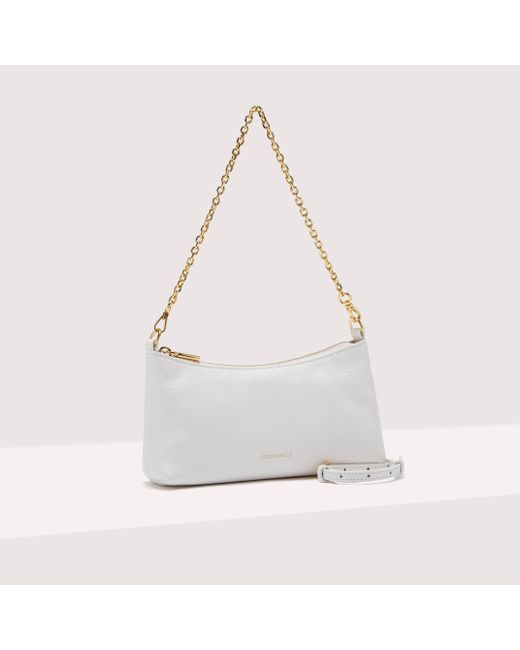 Coccinelle White Minibag aus genarbtem Leder Aura