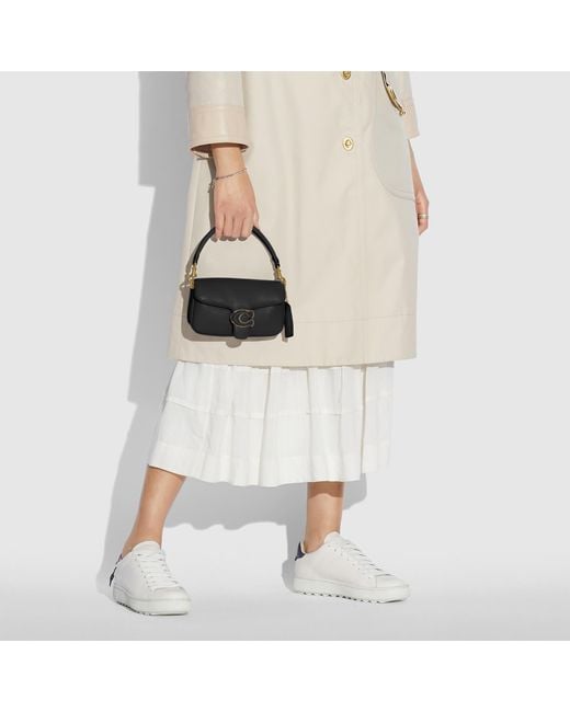 coach pillow tabby black