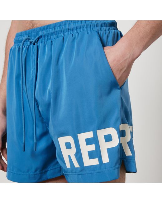 Represent Blue Logo-Print Shell Swim Shorts for men