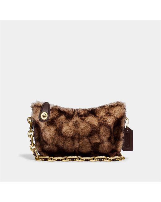 COACH Leather Shearling Swinger Bag in Brown | Lyst
