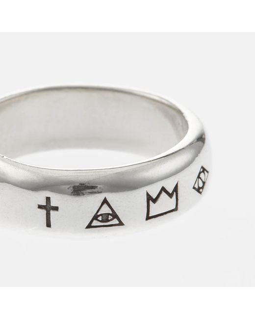 Serge Denimes Metallic Four Symbols Sterling Ring for men
