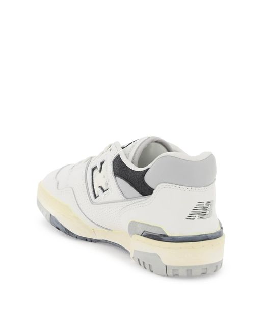 Sneakers 550 Effetto Vintage di New Balance in White