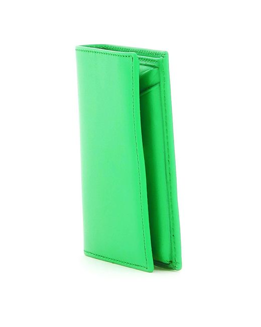 Portafoglio piccolo bi-fold in pelle di Comme des Garçons in Green da Uomo