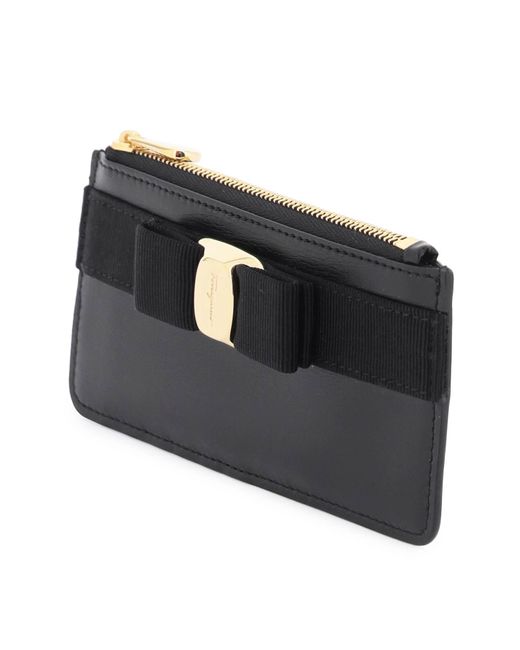 Ferragamo bow clearance wallet