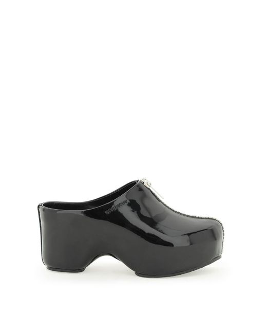 black patent leather clogs