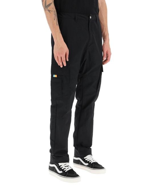 Pantaloni cargo di nylon di Marcelo Burlon in Black da Uomo