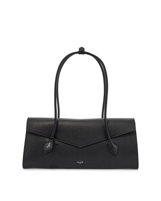 ALAIA 26S BALLET TECKEL IN BLACK CALFSKIN