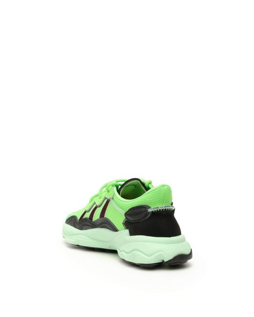 green ozweego sneakers