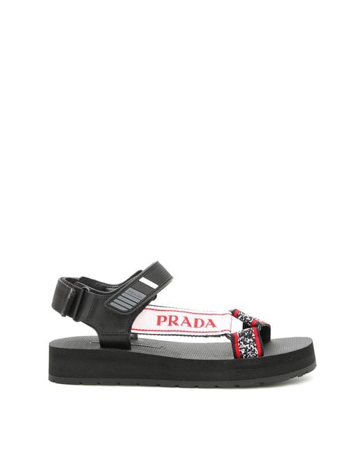 Prada Logo Nomad Sandals in Black | Lyst