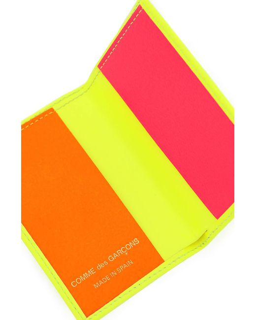 Comme des Garçons Yellow Comme Des Garcons Wallet Super Fluo Bi-fold Wallet for men