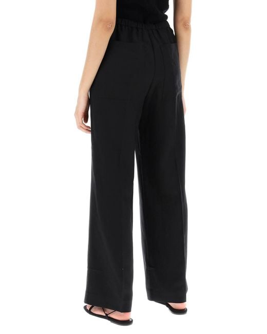 Totême  Black Toteme Lightweight Linen And Viscose Trousers