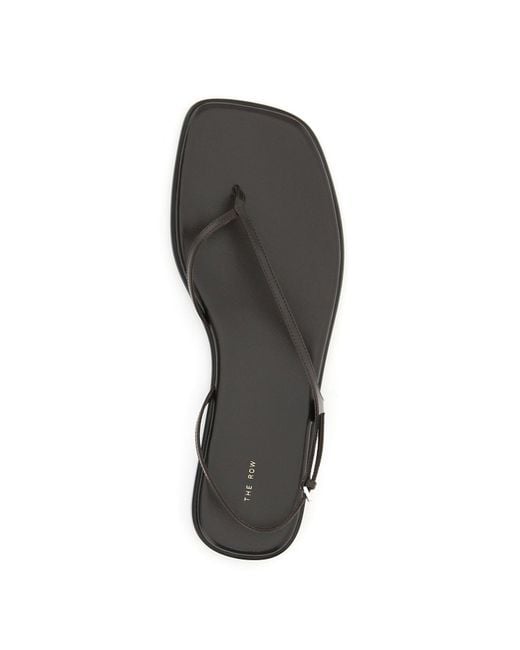 The Row Constance Flat Thong Sandals in Black Lyst