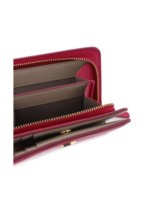 Portafoglio The J Marc Mini Compact Wallet di Marc Jacobs in Pink