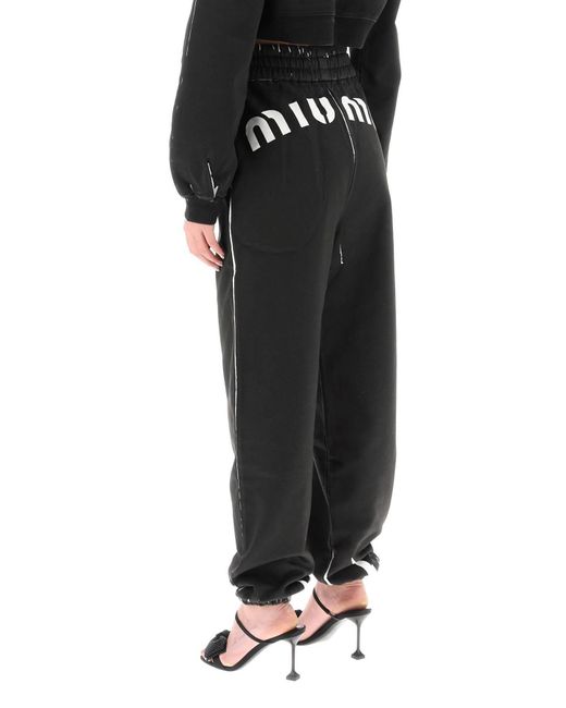 Pantaloni Jogger Con Maxi Stampa Logo di Miu Miu in Black
