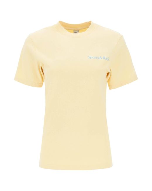 T Shirt 'Health Is Wealth' di Sporty & Rich in Yellow