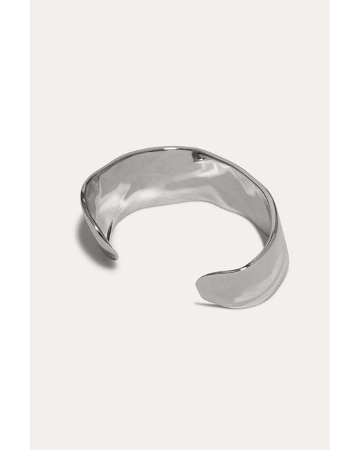 Completedworks Metallic Something Of Vast Importance Is Being Communicated Just Out Of Earshot