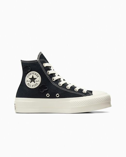 Converse hotsell with flowers