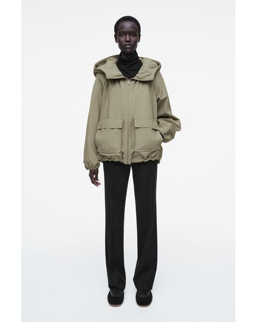 COS Technical Hooded Parka Jacket in Natural | Lyst