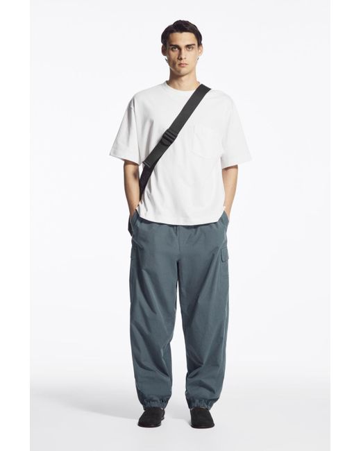 COS コス WIDE-LEG CARGO TROUSERS JERSEY WIDE-LEG TROUSERS - BLACK | COS