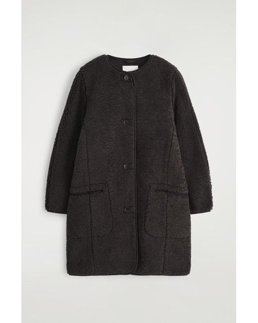 Giacca Teddy Lunga di COS in Black