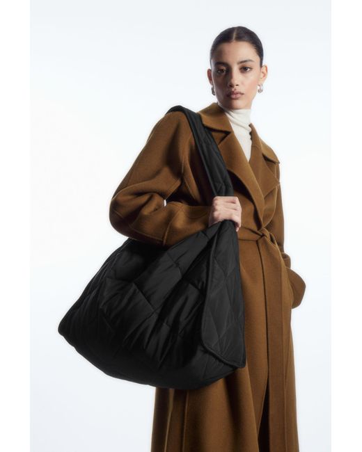Cos oversized diamond quilted bag in black lyst