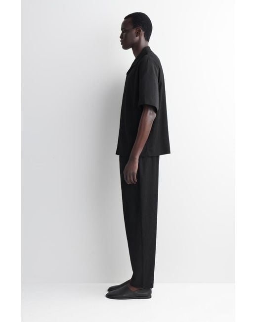COS Black Crinkled-Cotton Relaxed-Fit Tapered Pants for men