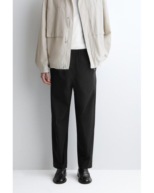 COS Black Elasticated Cotton Regular-Fit Tapered Trousers for men