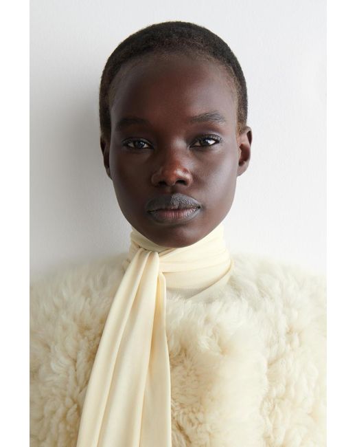 COS Natural Collarless Shearling Long Coat