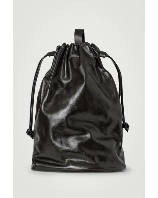 COS Leather Duffle Backpack in Black for Men | Lyst