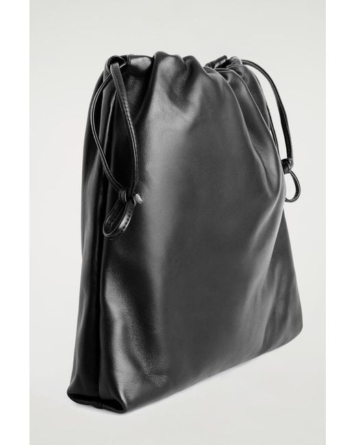 COS Black Drawstring Crossbody Bag