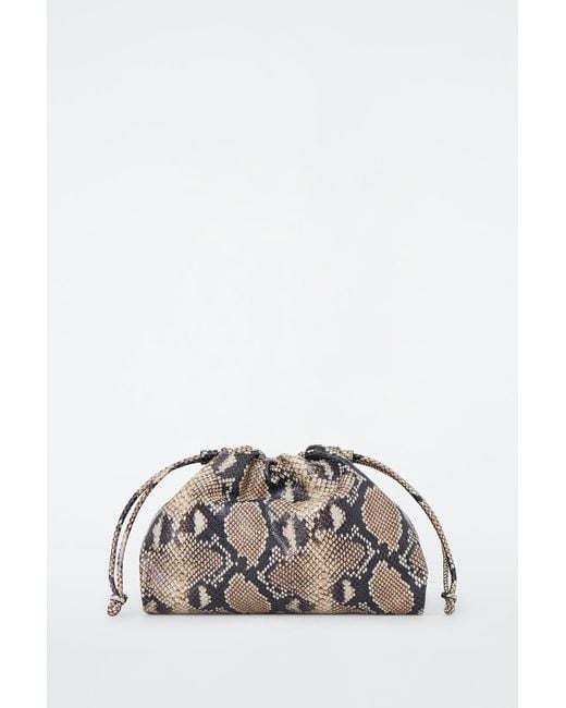 COS Mini Cavatelli Clutch Bag - Leather in Natural | Lyst