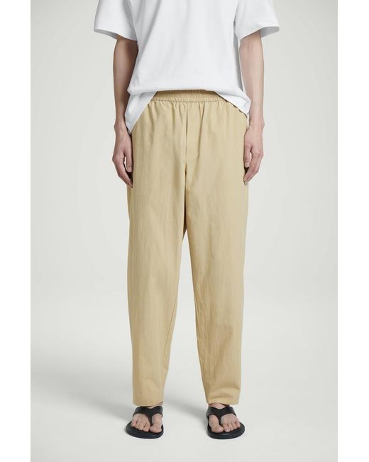 COS Natural Elasticated Cotton Regular-Fit Tapered Trousers for men