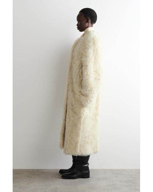 COS Natural Collarless Shearling Long Coat